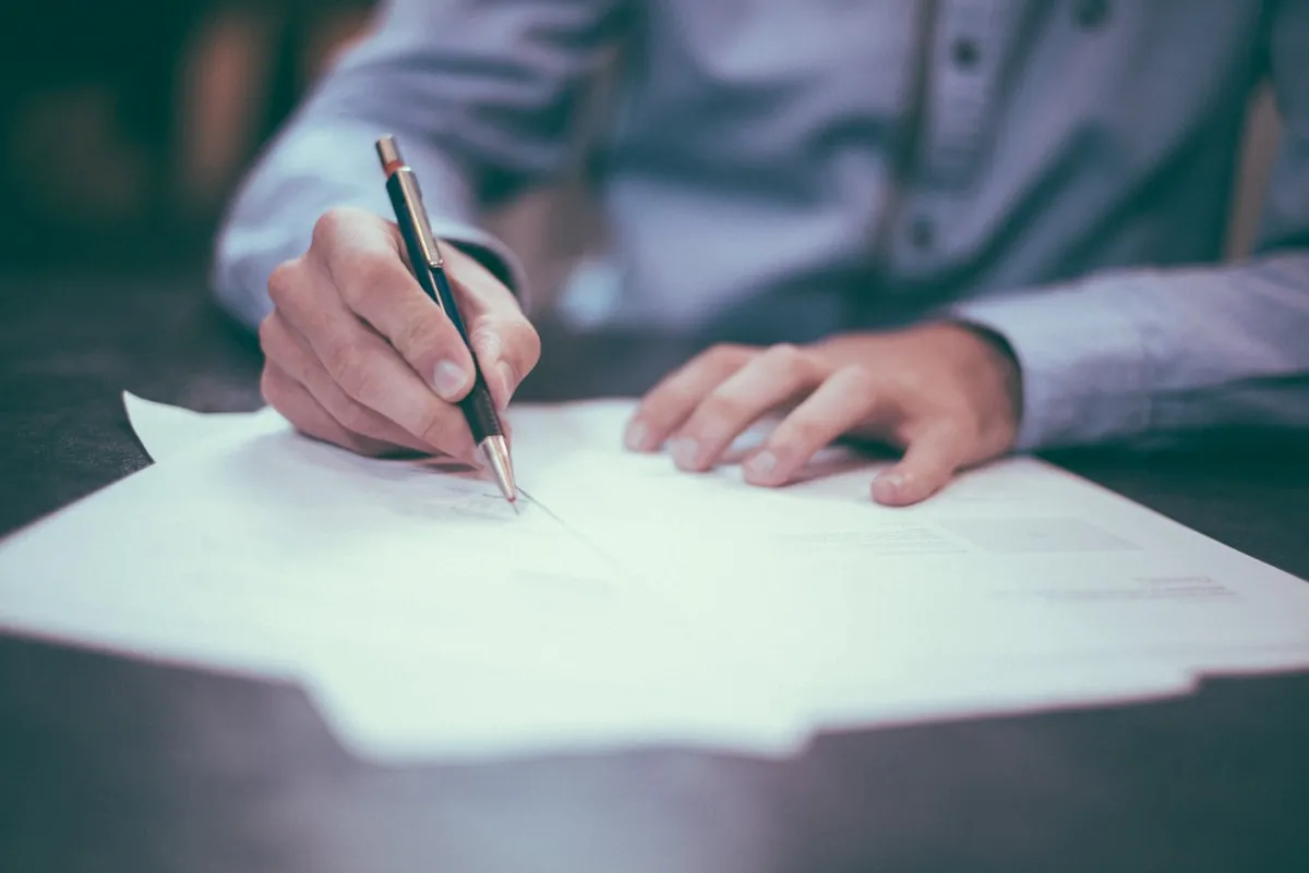 Owner signing a timeshare contract without reading the fine print