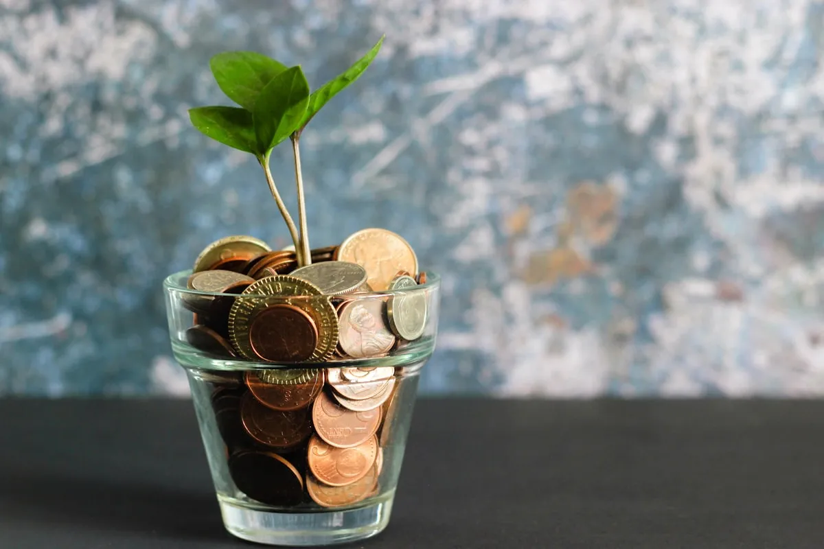Coins in a glass jar representing the rising long-term cost of timeshare financing